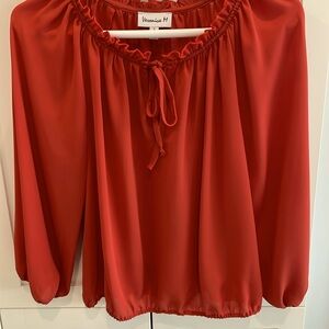 Orange long sleeve top